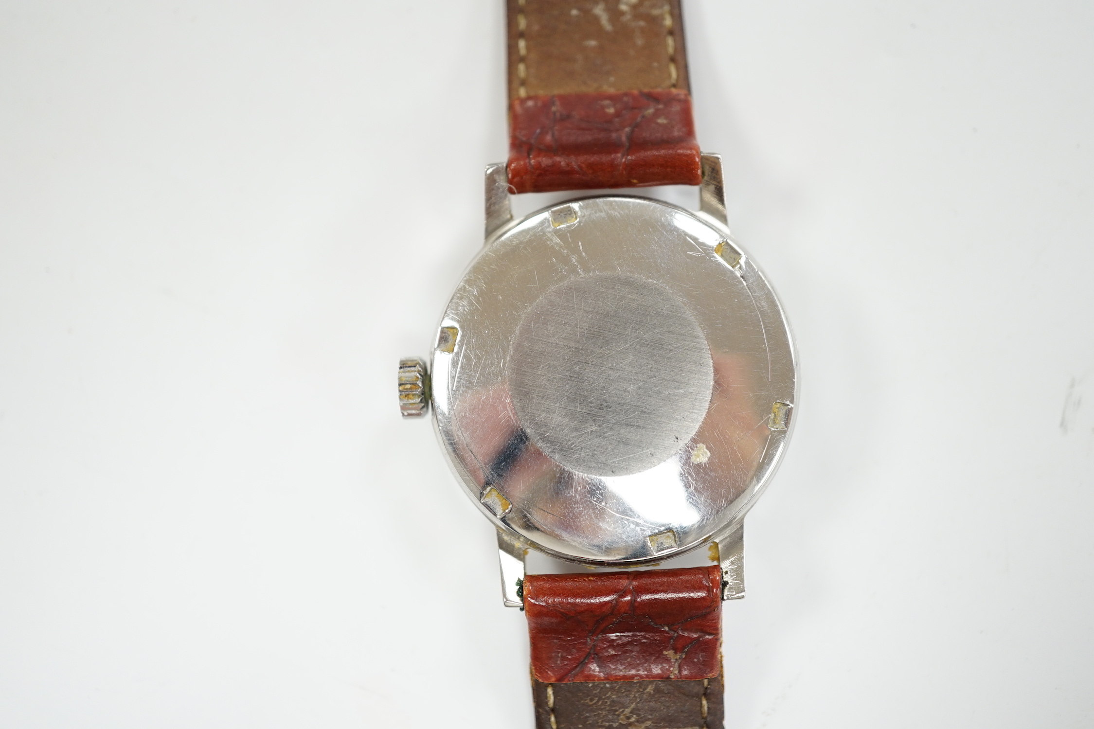A gentleman's stainless steel Omega automatic wrist watch, with date aperture, on associated leather strap with detached buckle, case diameter 36mm, box but no papers.